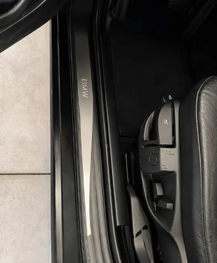 Grey car hood with visible swirl marks and scratches before correction